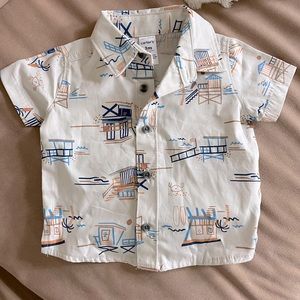 Never worn 3 month button down shirt with shorts set. Perfect condition